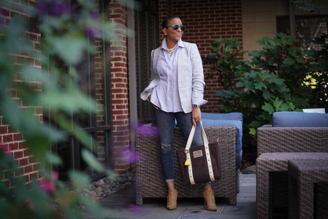 Tamarra Morris wears a lue and white three-quarter sleeve blazer and striped button-down, boyfriend-fit collared shirt, both from H&M. with distressed Gap jeans and vegan leather Steve Madden heels.