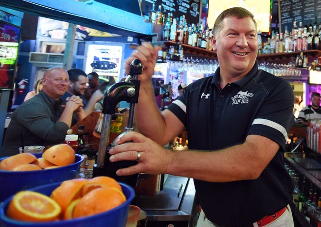 Drink an Orange Crush at the Starboard in Dewey Beach. Here, co-owner Steve " Monty " Montgomery makes one.
