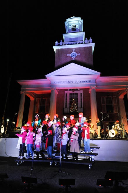 Sing along at Caroling on the Square in Wilmington or on the Circle in Georgetown, seen here.