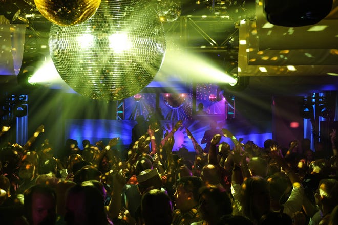 Hundreds danced under a disco ball at Sundance, CAMP Rehoboth's 31st annual fundraiser that was held Sept. 1 and 2 at the Rehoboth Beach Convention Center. Sundance was held this year in memory of CAMP Rehoboth co-founder Steve Elkins, who died of lymphoma earlier in March.