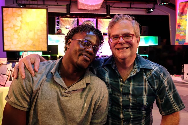 Jammal Burnett and Rick Miller hung out on the stage of Sundance, CAMP Rehoboth's 31st annual fundraiser, filled with dance, disco and a live auction. The couple met four years ago at a gym, where Burnett worked as a personal trainer.