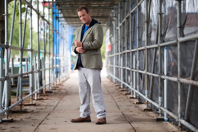 Tim Carr wears a tan sports coat from Jos A Bank; navy hoodie from Gildan; blue T-shirt from Delmarva Blood Bank; Dockers Easy Khaki pants;  and brown dress leather shoes from Sonoma.
