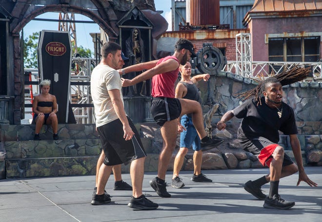 Dancers practice their moves as they prepare for the Dead Manâ€™s Party show that is part of Fright Night at Six Flags Great Adventure.