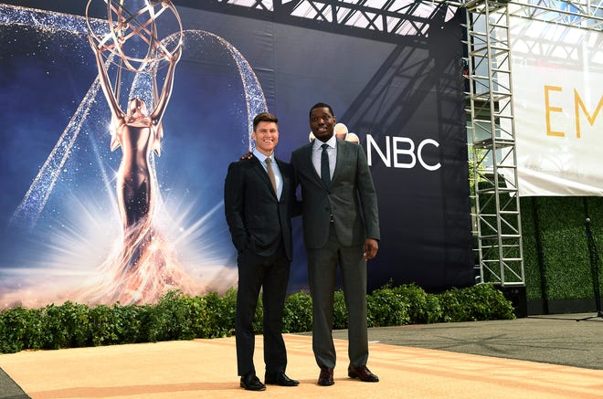 Colin Jost and Michael Che roll out the gold carpet for the 70th Emmy Awards at Microsoft Theater.