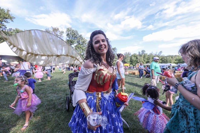 A Wonder Woman-themed costume was one of the creative looks at Sunday's Faerie Festival at Rockwood Park in Wilmington.