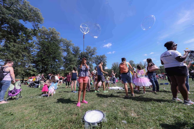 Big bubbles wafted across the sixth annual Faerie Festival Sunday, Sept. 16, 2018, Rockwood Park in Wilmington.
