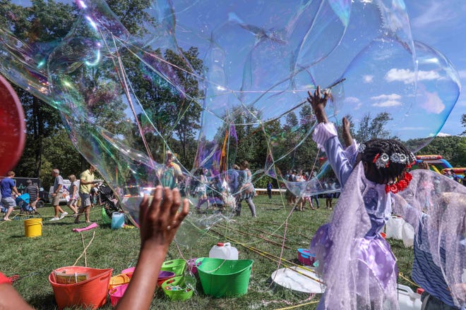 Bubbles were a big draw at the sixth annual Faerie Festival Sunday, Sept. 16, 2018, Rockwood Park in Wilmington.