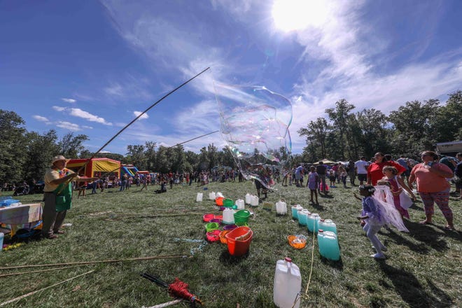 Giant bubbles drew excited fans at the  sixth annual Faerie Festival Sunday, Sept. 16, 2018, Rockwood Park in Wilmington.