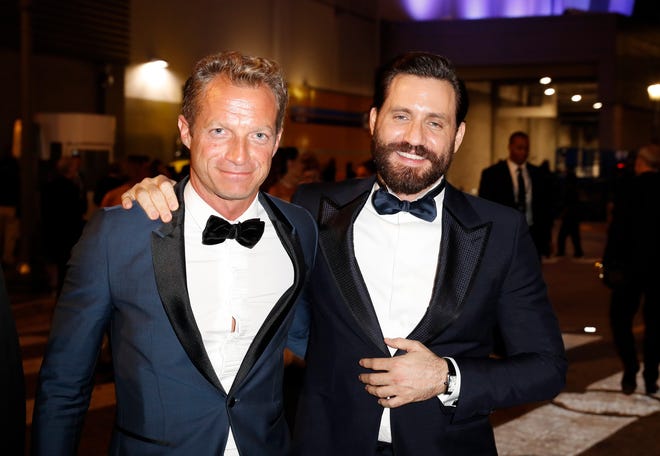 Writer Tom Rob Smith, left, and actor Edgar Ramirez behind the scenes. Both were nominated for their work in " The Assassination of Gianni Versace: American Crime Story.