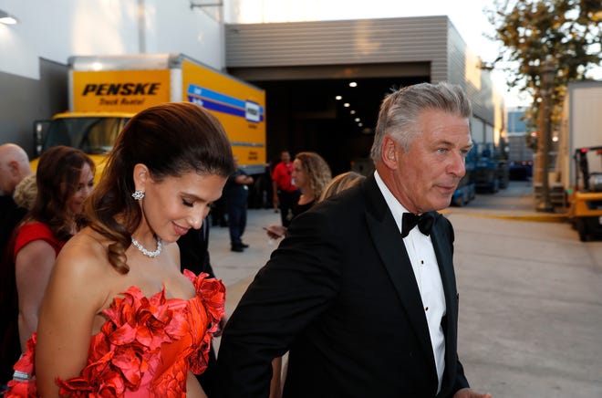 Hilaria and Alec Baldwin make their way behind the scenes at the Emmy Awards.