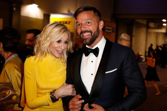 USA TODAY gives you an exclusive peek at the action "at the back of house" at the 70th Primetime Emmy Awards.  Judith Light shares a moment with Ricky Martin.