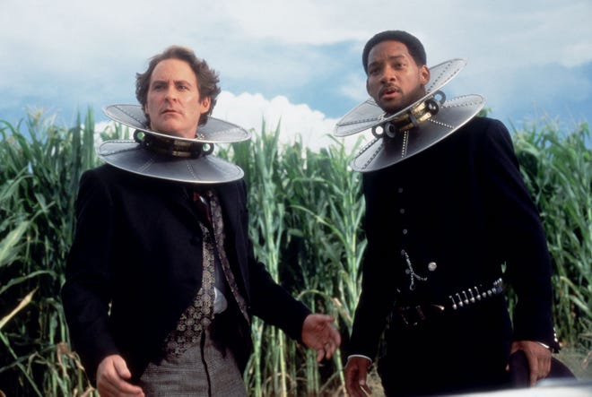 Prisoners Artemus Gordon (Kevin Kline, left) and James West (Will Smith) are forced to wear magnetic collars in 1999 ' s " Wild Wild West.