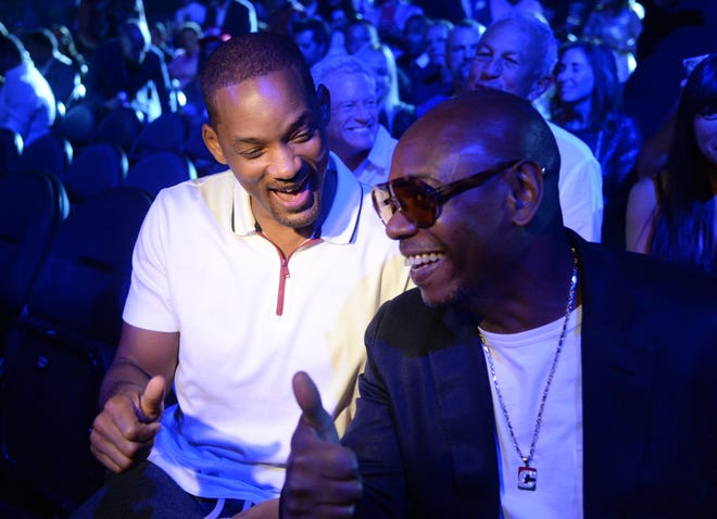 Will Smith and Dave Chappelle attend the Canelo Alvarez and Gennady Golovkin middleweight world championship boxing match at T-Mobile Arena on Sept. 15, 2018.