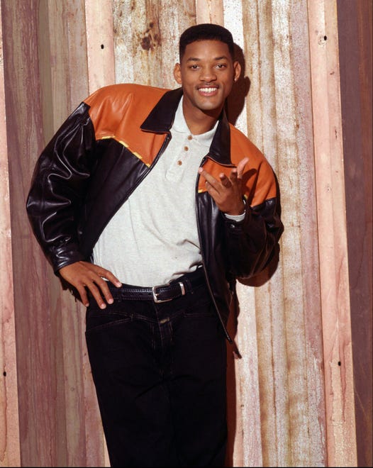 Will Smith has become a bonafide Hollywood icon. The actor and rapper is as well known for his roles in big-budget movies and TV shows as he is for his equally successful family. Look back at the star through the years, including this shot from his days as the star of ' 90s sitcom " The Fresh Prince of Bel-Air.