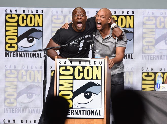 Terry Crews (left) and Will Smith speak onstage at Netflix ' s " Bright " and " Death Note " panel during Comic-Con on July 20, 2017, in San Diego.
