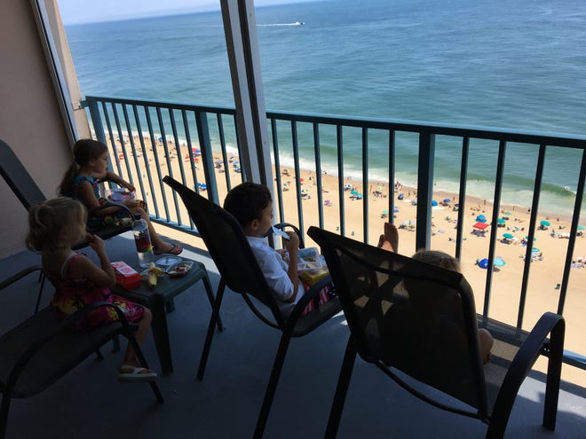 The Jancosko children look out on the oceanfront view of their new Ocean City home featured on HGTV's "Beachfront Bargain Hunt." Courtesy of Angela Jancosko.