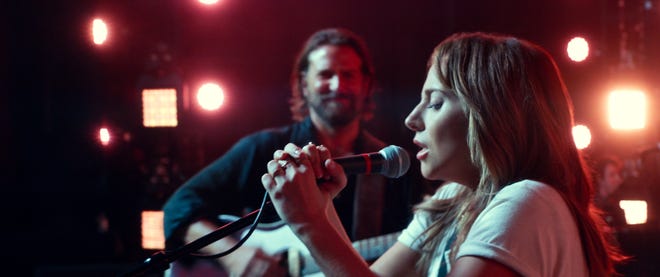 In "A Star Is Born," Bradley Cooper (left), who also directed, plays a self-destructive music legend who falls and nurtures a talented singer-songwriter played by Lady Gaga.