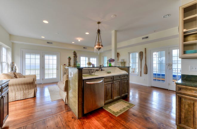 The open concept family room at 1416 S. Bay Shore Drive at Broadkill Beach is open to the kitchen.