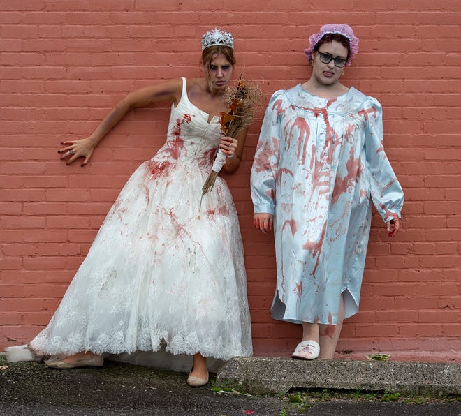Jenna Montalbano, left, of Rehoboth and Jessica Wolanski of Millsboro dressed up for Milton Zombie Fest.