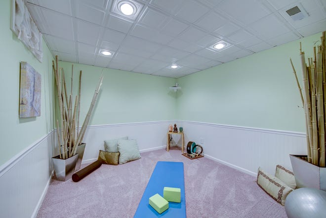 The lower level of 204 Lakeview Shores in Rehoboth Beach includes a designated yoga studio.