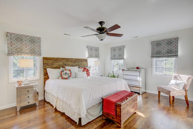 The first-floor master bedroom at 204 Lakeview Shores has lots of natural light.