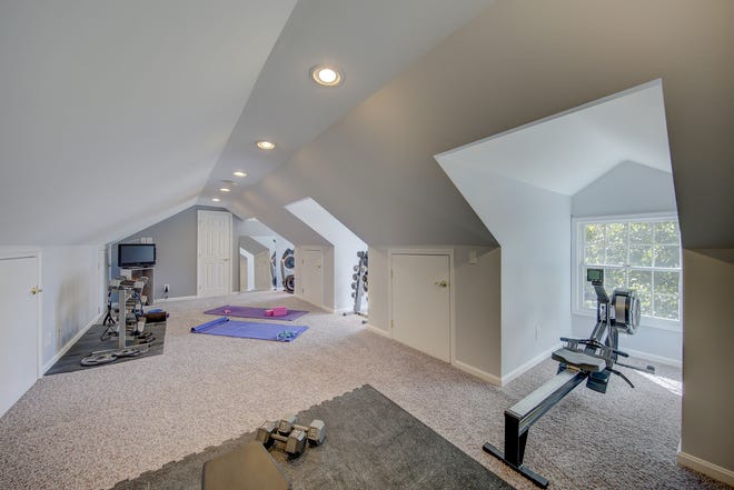 An in-law suite over a three-car garage at 204 Lakeview Shores in Rehoboth Beach is currently used as a home gym.
