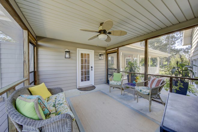 The house at 204 Lakeview Shores in Rehoboth Beach features a screened porch.