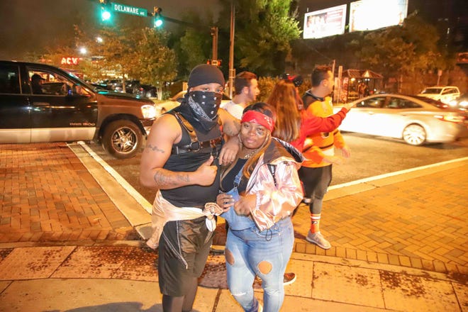 Patrons stop for a photo during the annual Halloween Loop Saturday, Oct. 27, 2018, in Wilmington.