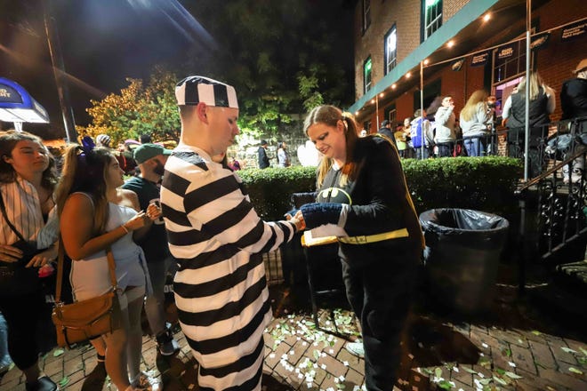 Patrons outside Kelly ' s Logan House during the annual Halloween Loop Saturday, Oct. 27, 2018, in Trolley Square in Wilmington.