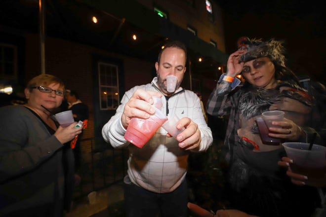 Costumed partygoers were out for the annual Halloween Loop Saturday, Oct. 27, 2018, in Wilmington.