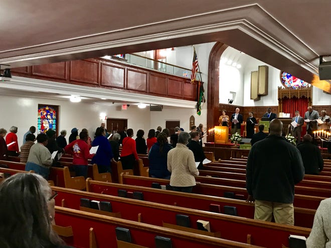 Congregants attend an interfaith prayer session at the Bethel African Methodist Episcopal Church in Wilmington to express solidarity against anti-Semitism