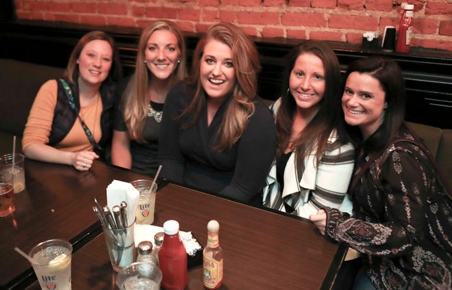 Patrons hit Scratch Magoo's during Thanksgiving-Eve revelry in Wilmington.