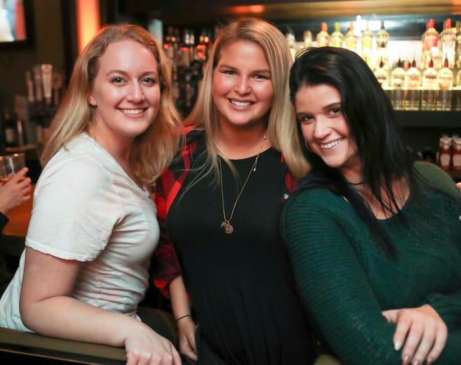 Patrons hit Scratch Magoo's during Thanksgiving-Eve revelry in Wilmington   Wednesday.