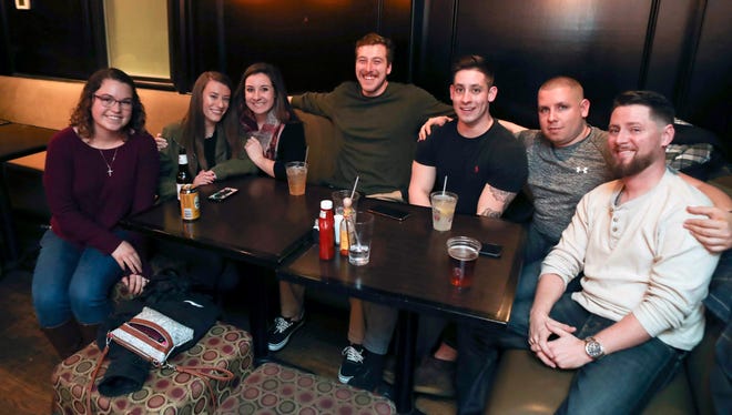 Patrons hit Scratch Magoo's during Thanksgiving-Eve revelry in Wilmington   Wednesday.