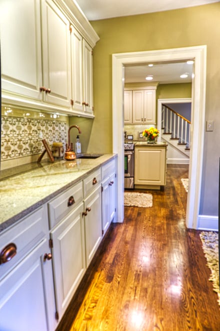 A butler's pantry at 2 Alapocas Drive leads from the kitchen to the dining room.