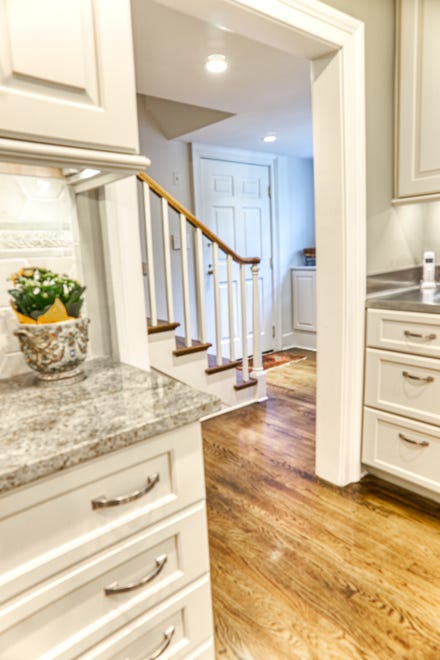 The kitchen at 2 Alapocas Drive leads to a mud room at the back of the house.