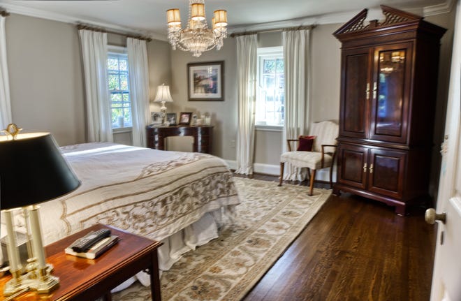 The master bedroom at 2 Alapocas Drive  is one of four bedrooms in the home.