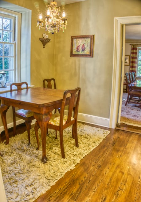 A breakfast nook across from the butler's pantry at 2 Alapocas Drive connects the kitchen and dining room.