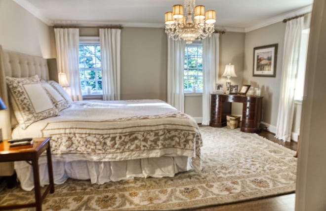 The master bedroom at 2 Alapocas Drive  is one of four bedrooms in the home.