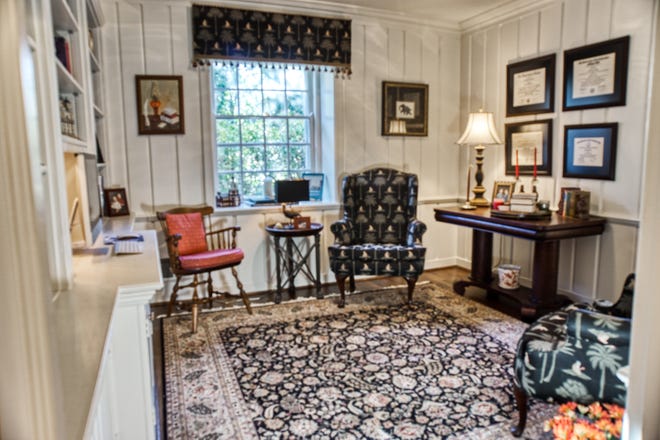 The den at 2 Alapocas Drive features the original millwork and cabinetry.