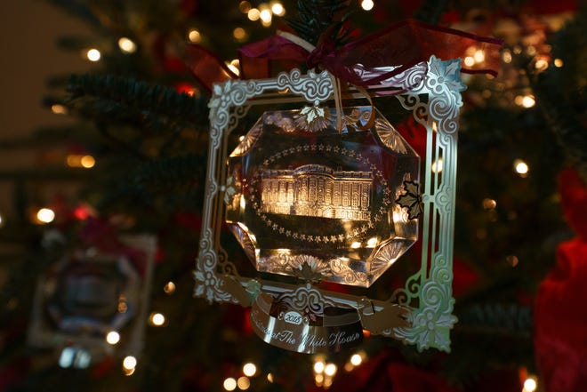 The First Family ' s official Christmas ornament. First lady Melania Trump designed the holiday decor, which features a theme of " American Treasures.
