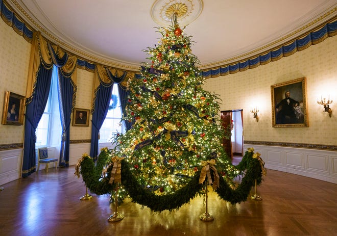 The official White House Christmas tree is seen in the Blue Room during the Christmas press preview at the White House in Washington, D.C.
