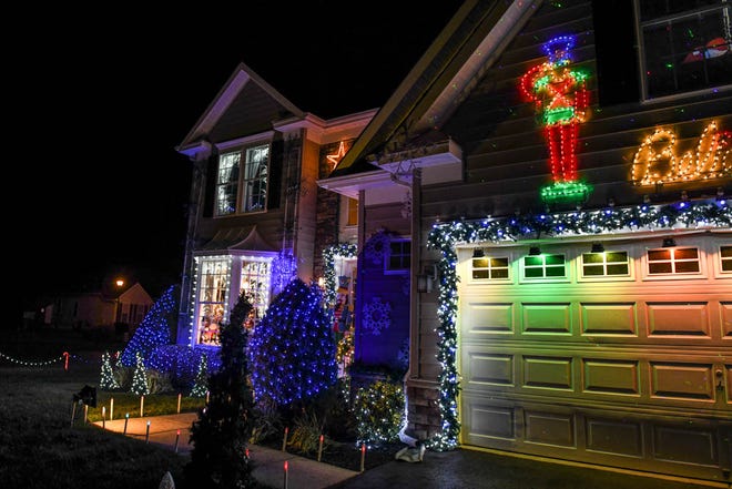 50,000 lights set to music illuminate a Lewes home for the holidays on Tuesday, Dec 4, 2018.