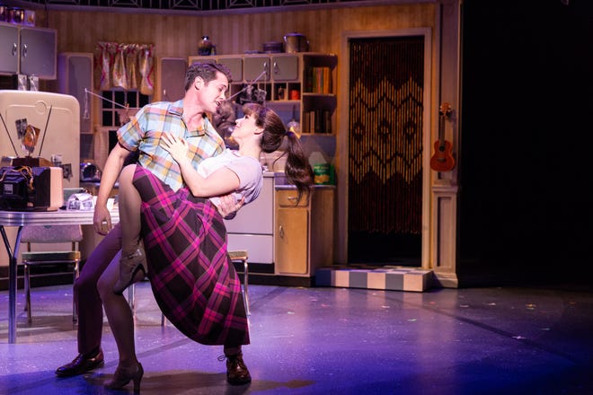 Dennis (Drew Seeley) wants Cindy (Chilina Kennedy) to stay barefoot and pregnant in Ohio, but she's got other ideas in Delaware Theatre Co.'s 'A Sign of The Times.'