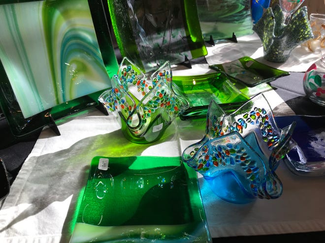 Lisa Sabol's fused and kiln formed glass glowed as sunshine hit it. And somebody bought that green bowl before I could get back to it. shegotglass.com