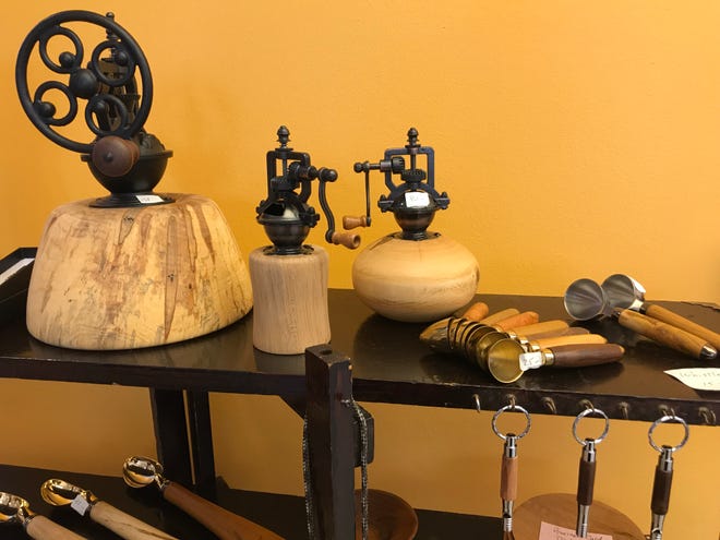 Lathe-meister John A. Styer creates turned-wood heirlooms, including pens made from poison ivy wood and small magnifying glass pendants. lathe-meister.com