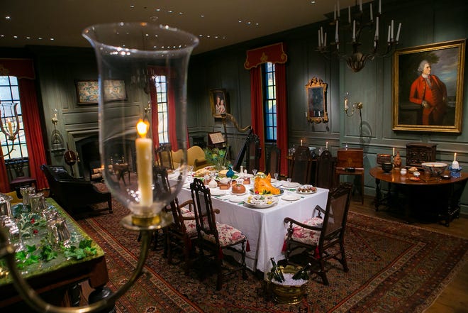 This table in Winterthur's Marlboro room is inspired by Washington Irving's tales of old English Christmases, complete with a hog's head and meat pie decorated like a peacock.