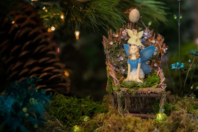 Guests can tour the Yuletide at Winterthur through Jan. 6. Here, Mack Truax's tree honoring the children's garden features fairies who are busy decoration the tree.