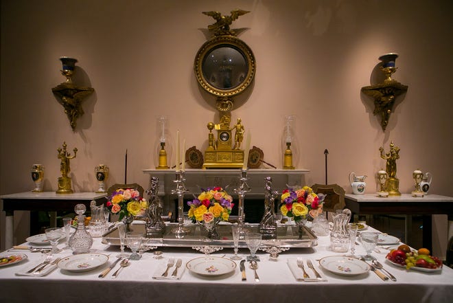 This elegant tablescape shows how the du Pont family might have celebrated New Year's Eve, complete with flowers from their hothouse.