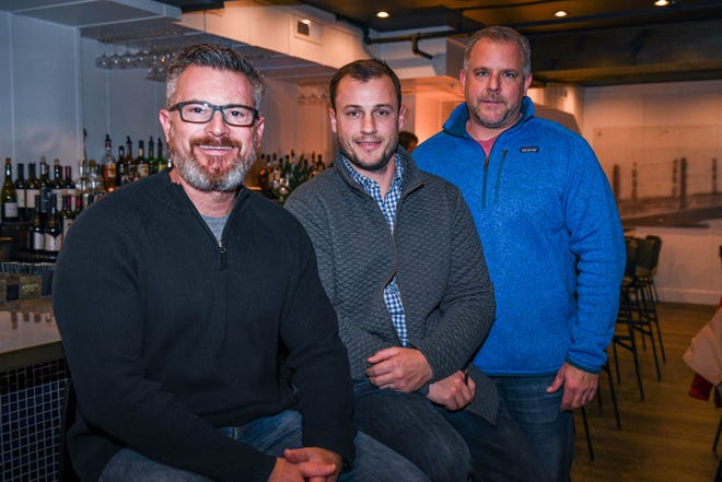 Owners Bob Suppies, Tyler Townsend and Dave Gonce (left to right) pose at their new Rehoboth Beach restaurant The Pines on Tuesday, Dec 11, 2018. The modern tavern aims to infuse classic dishes with creative, locally sourced ingredients.